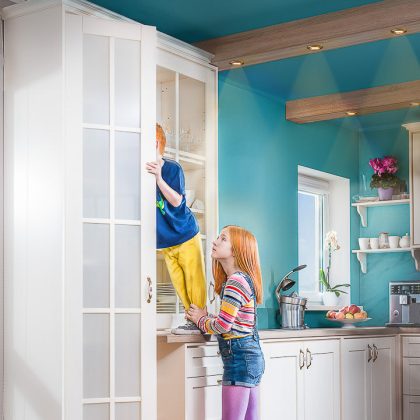 Girl Playing with Wooden Shelves – Child Lifestyle Portrait